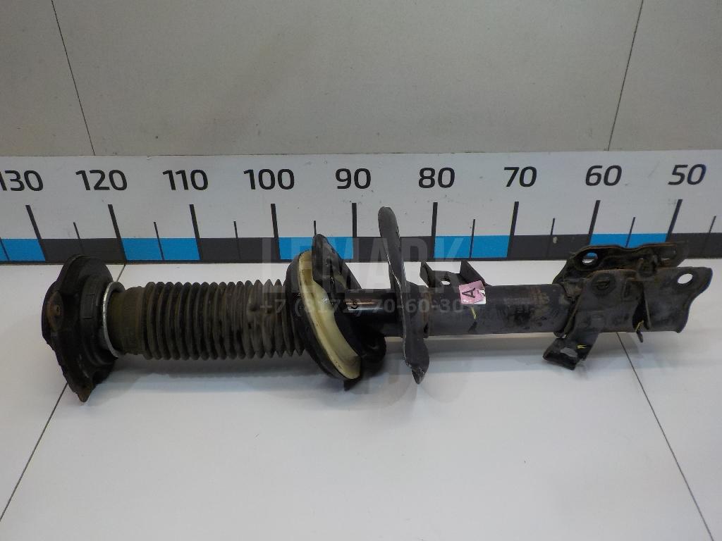 Амортизатор передний левый E43033UB1A Nissan