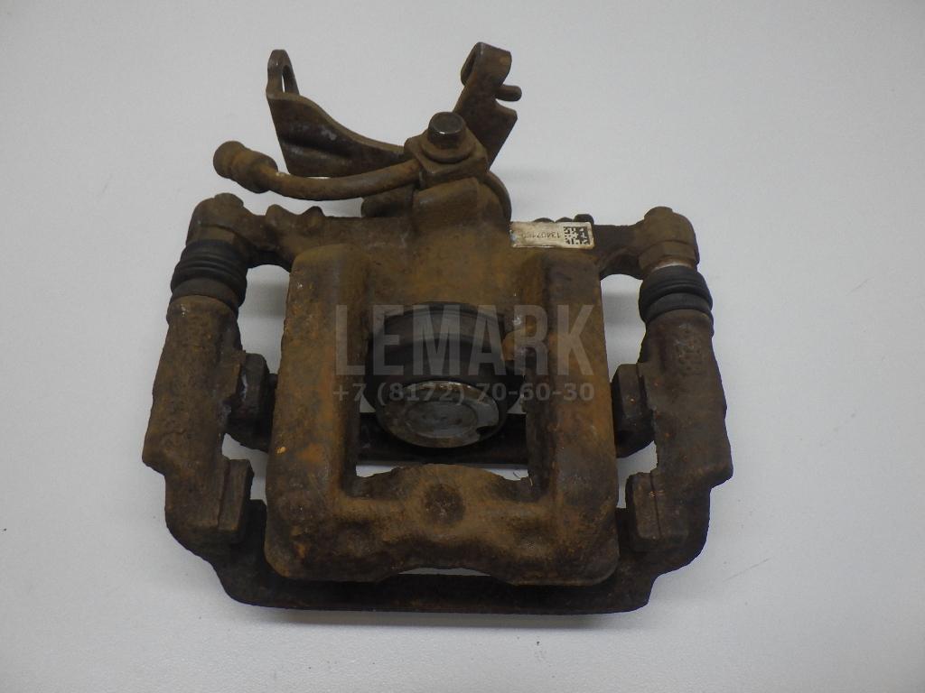 Суппорт тормозной задний левый 542110 GM