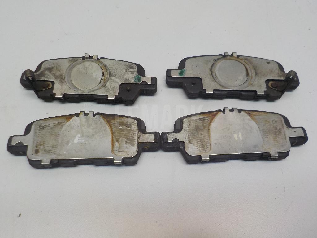 Колодки тормозные задние дисковые к-кт D40604BA0C Nissan