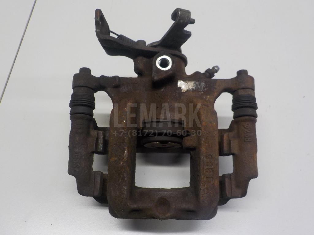 Суппорт тормозной задний левый 542110 GM