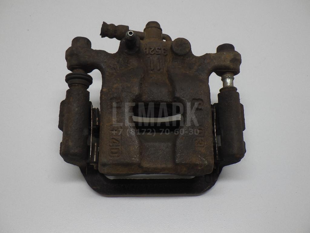 Суппорт тормозной задний левый 440111KD0A Nissan
