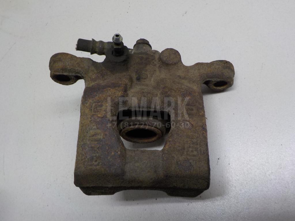 Суппорт тормозной задний левый 440111KD0A Nissan