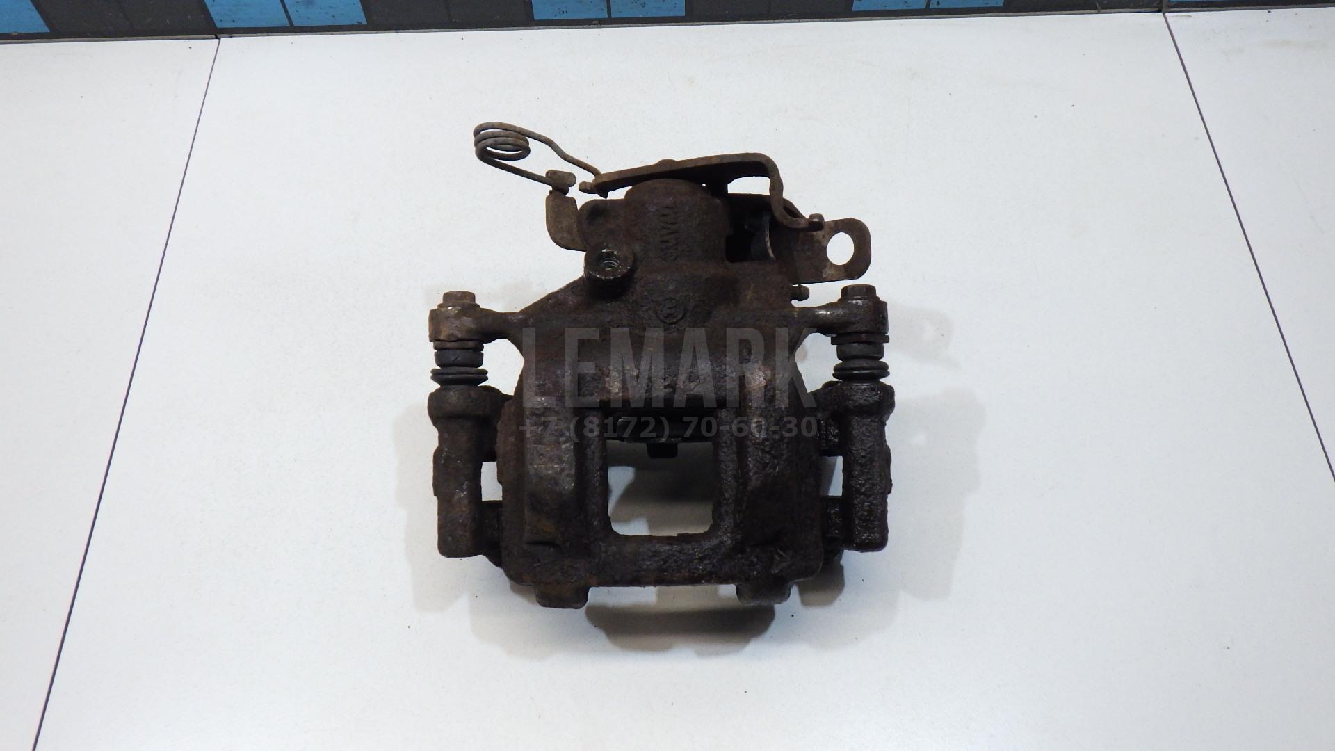 Суппорт тормозной задний правый 1843318 Ford