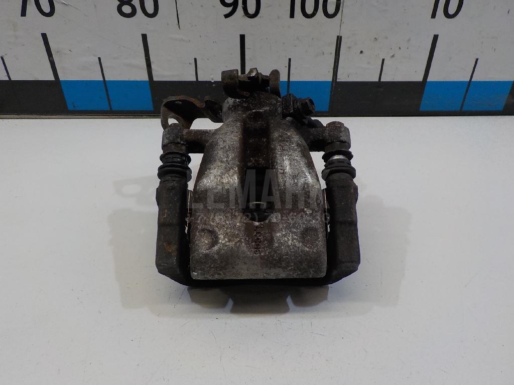 Суппорт тормозной задний правый 542106 GM