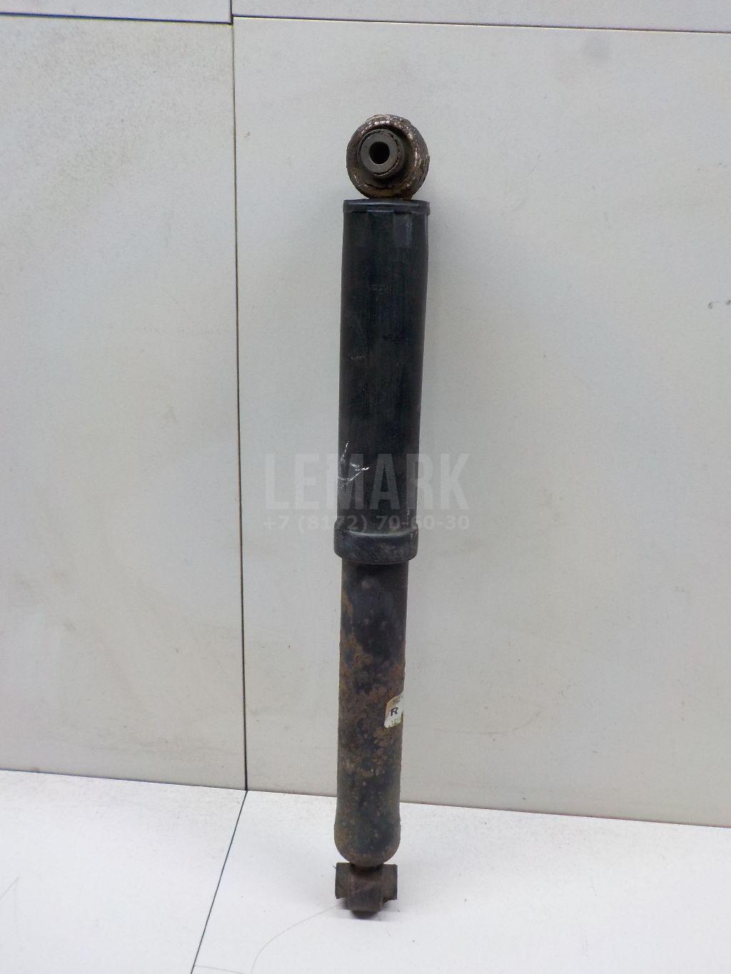 Амортизатор задний E6210JG01A Nissan