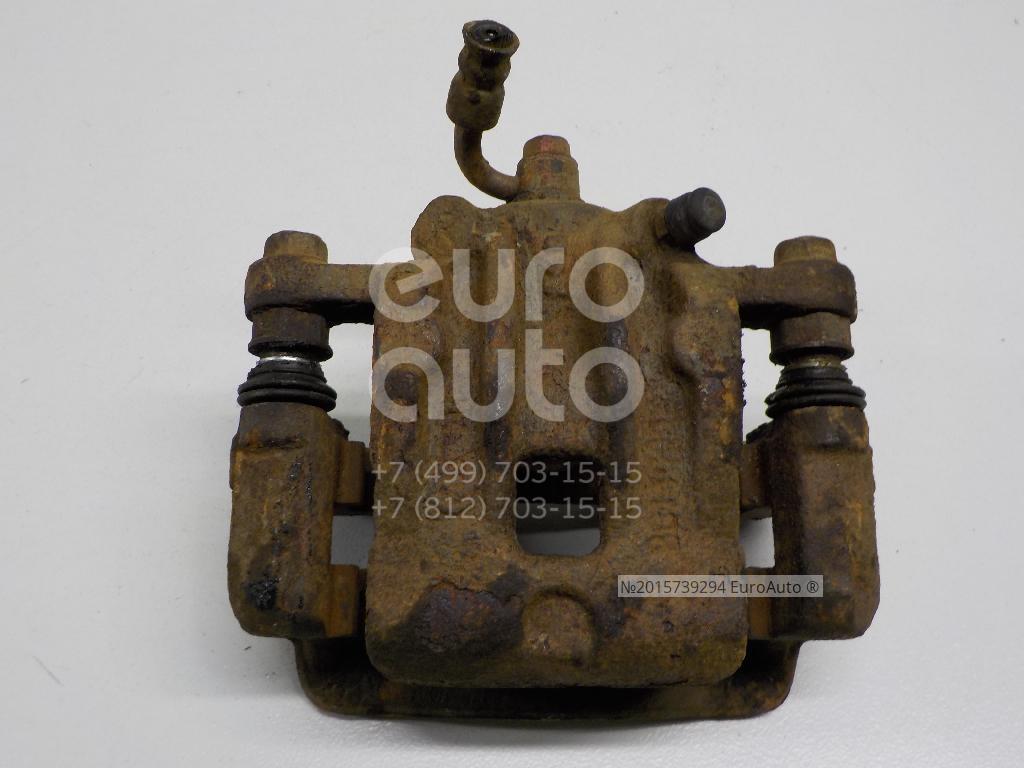 Ssangyong actyon new задний суппорт. Ex4841034050 суппорт тормозной левый.