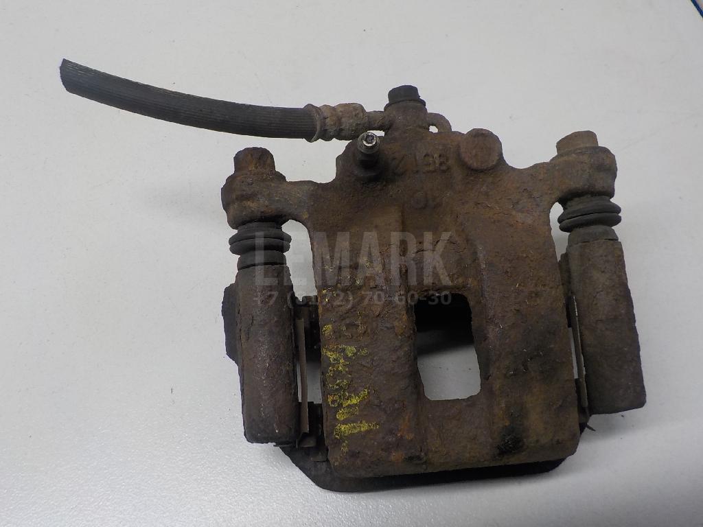 Суппорт тормозной задний левый 440118H300 Nissan