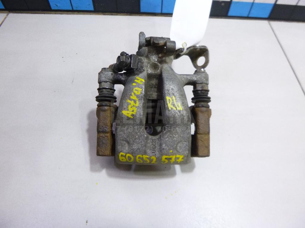 Суппорт тормозной задний левый 542096 GM