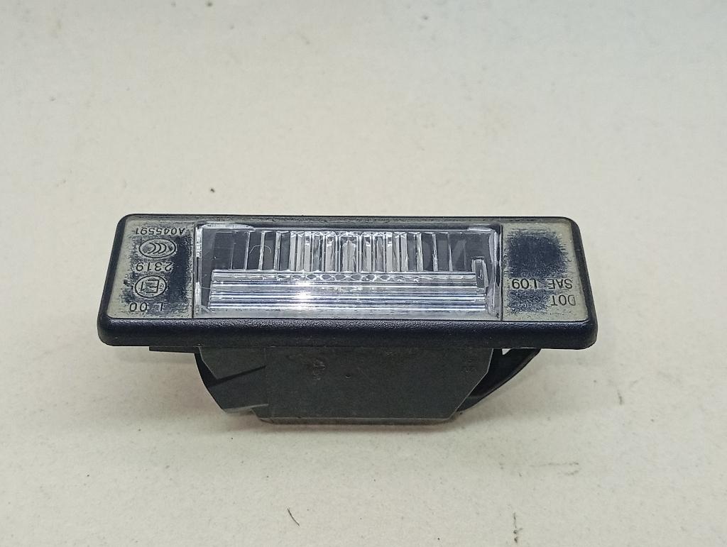 Фонарь подсветки номера 265108990A Nissan