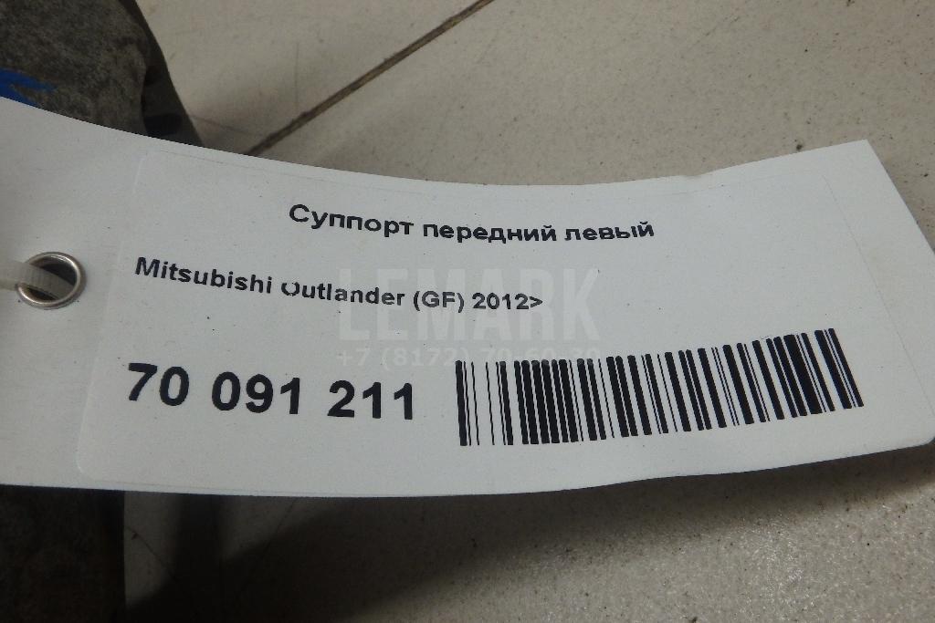 Суппорт тормозной передний левый
