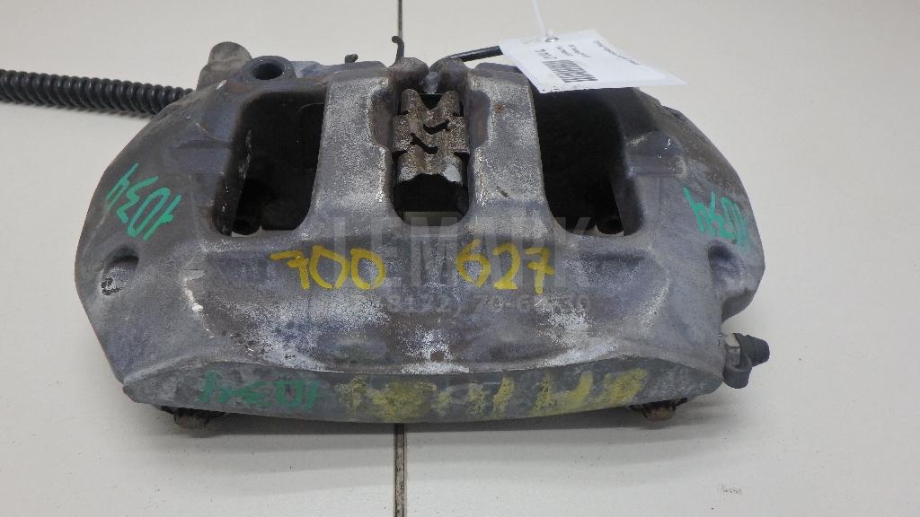 Суппорт тормозной задний левый 7P6615423D VAG