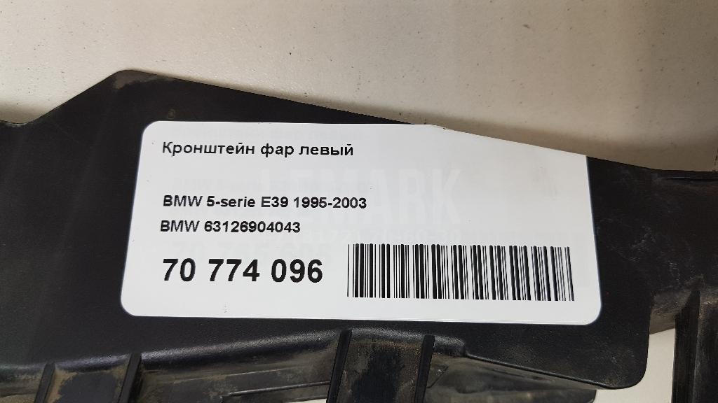 Кронштейн фар левый для  Cadillac DTS 2005-2011