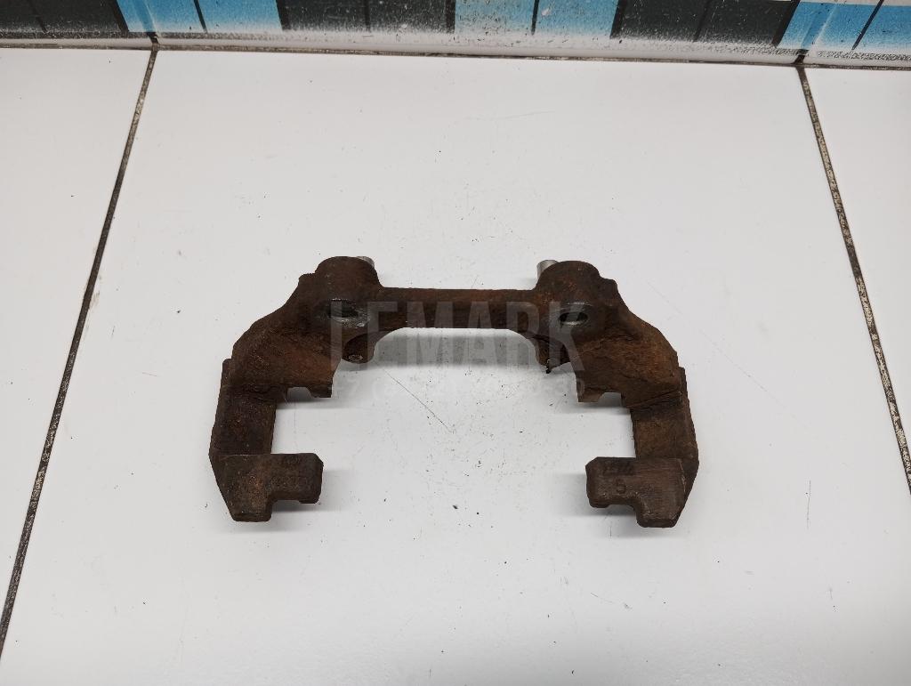 Скоба суппорта переднего 6R0615125 VAG