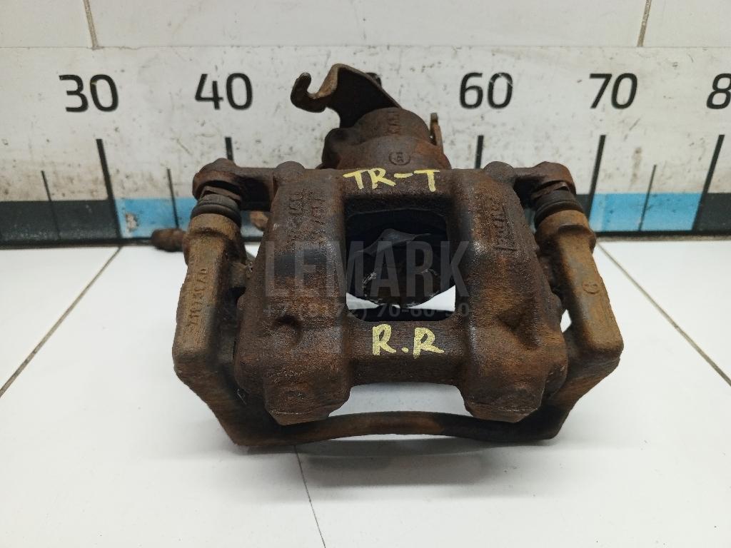 Суппорт тормозной задний правый 1818003 Ford