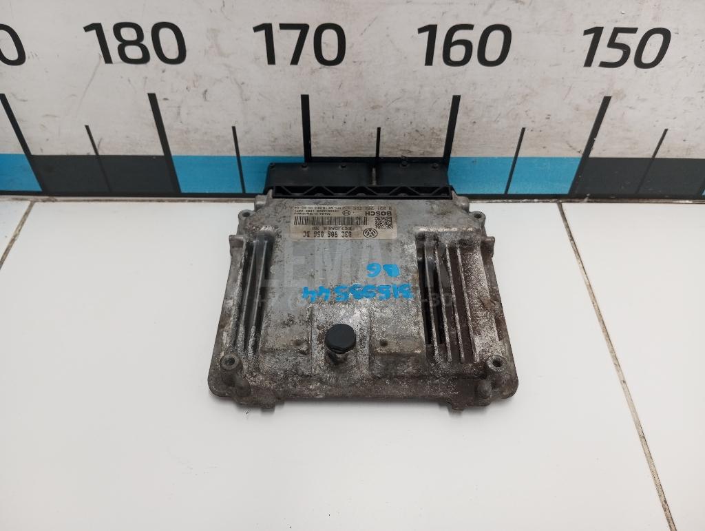 Блок управления двигателем 03C906056DC VAG