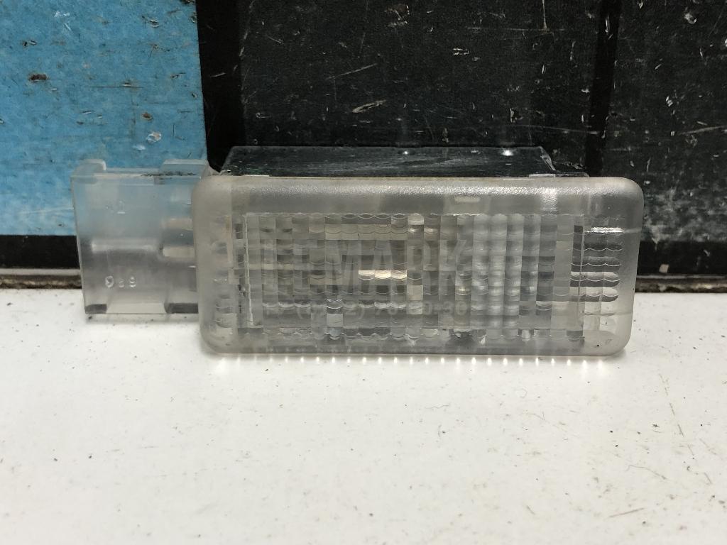 Фонарь подсветки двери 6L0947565 VAG