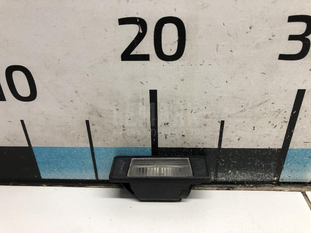 Фонарь подсветки номера 26510JD00A Nissan
