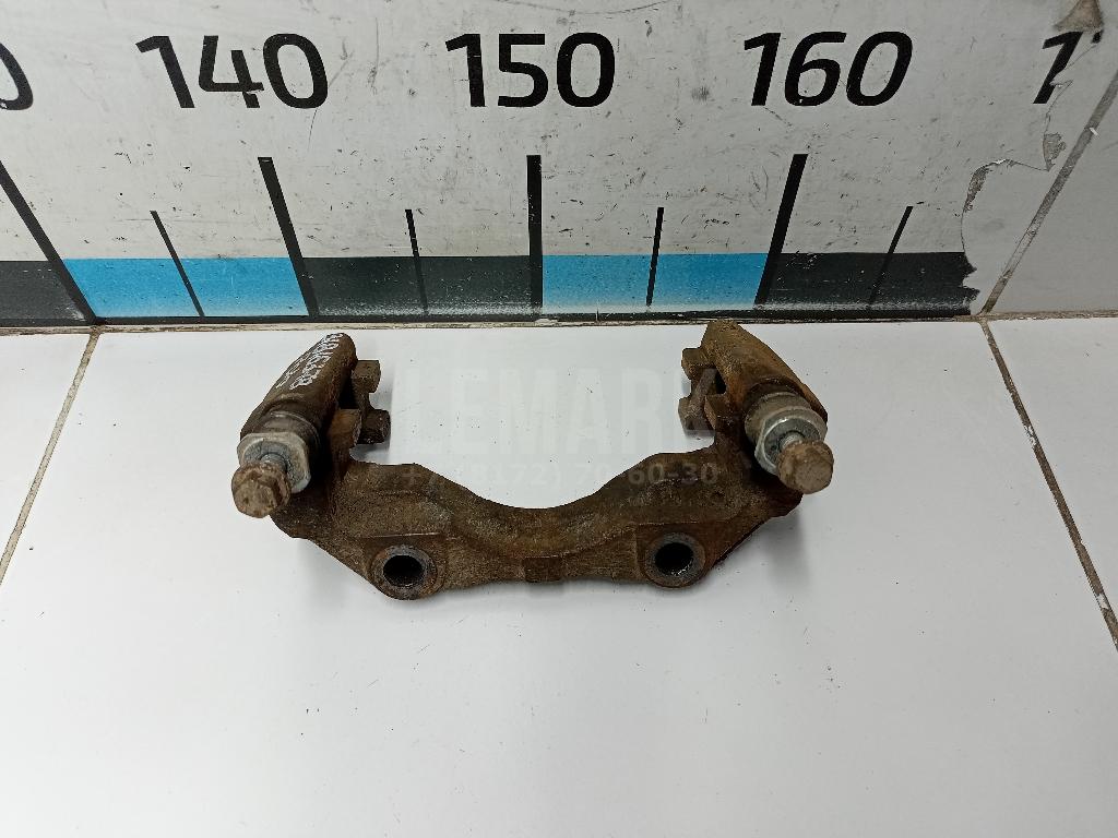 Скоба суппорта переднего 6RF615125 VAG