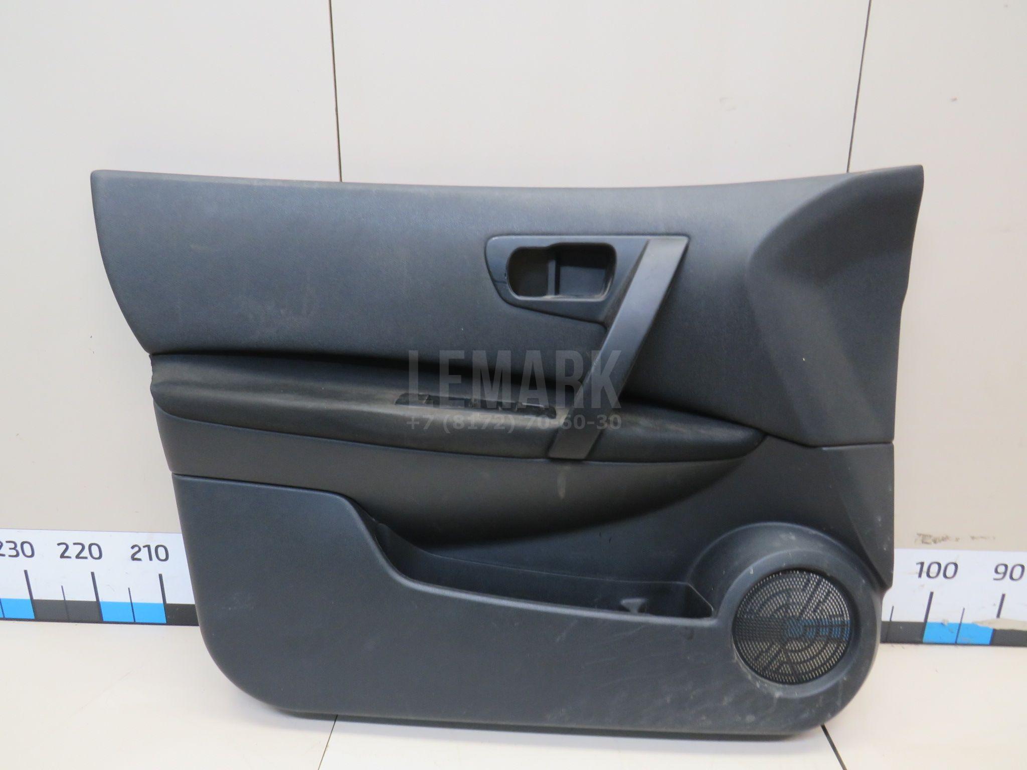 Обшивка двери передней левой 80901JD110 Nissan