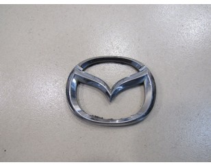 Эмблема на крышку багажника для Mazda 626 (GF) 1997-2002 с разбора состояние отличное