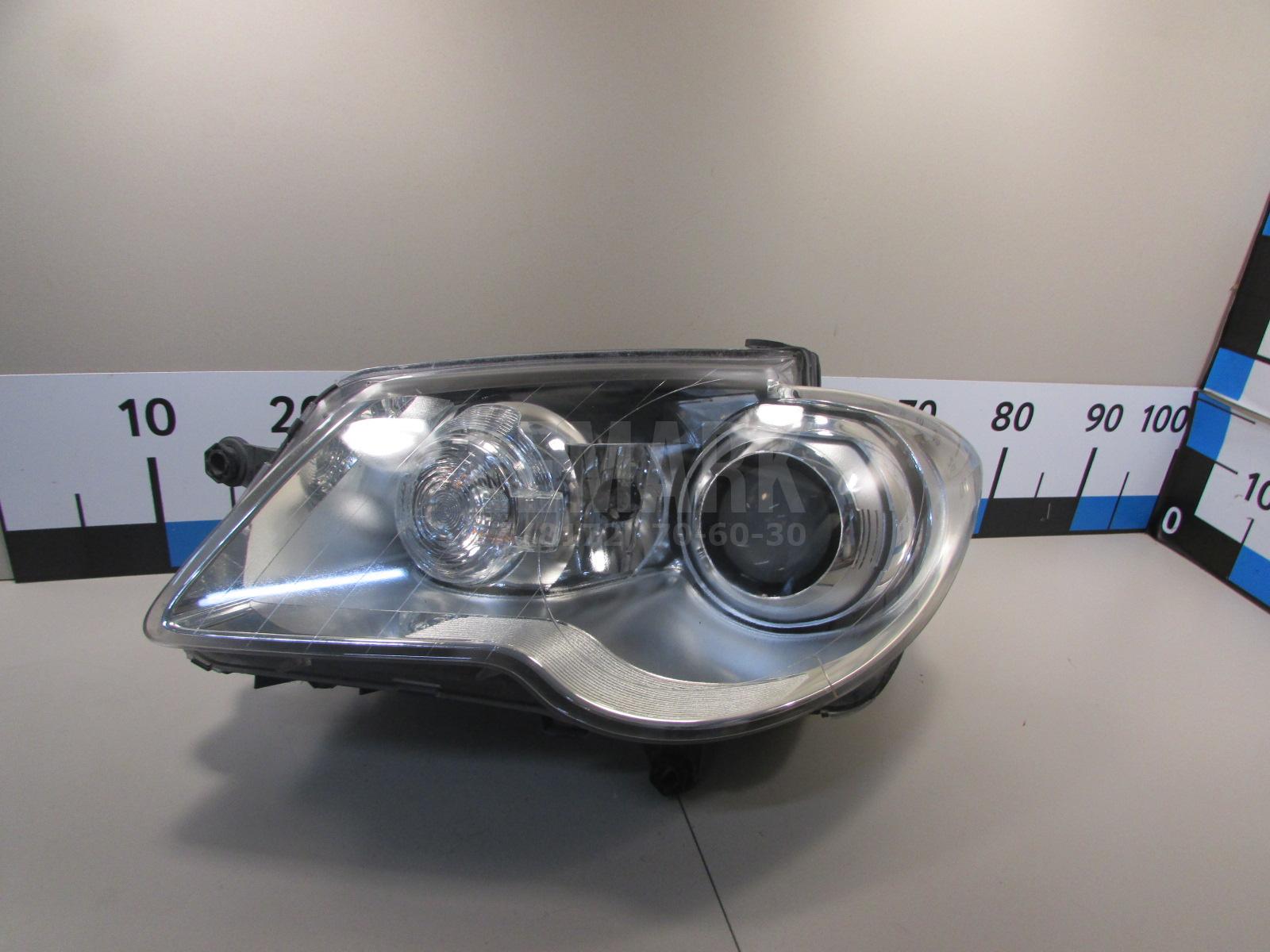 Фара левая 1T2941753A VAG
