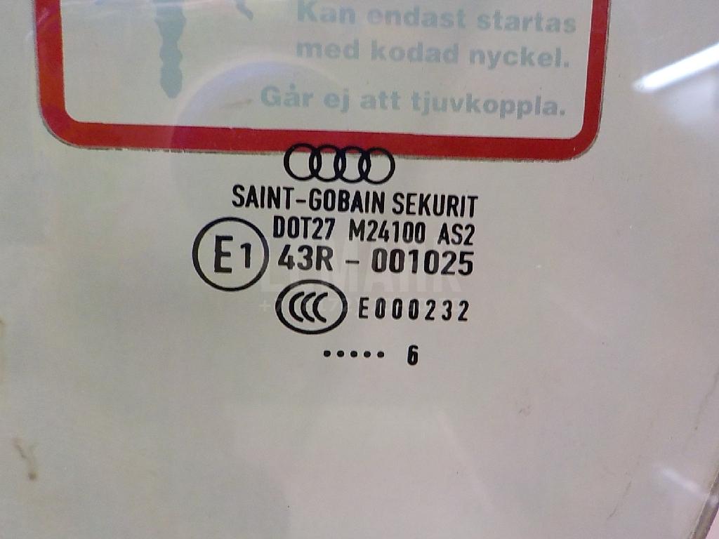 Стекло двери передней левой