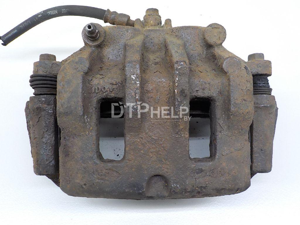 Фото Суппорт тормозной передний левый для Hyundai Starex H1/Grand Starex  2008