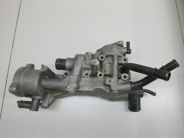 Корпус термостата 256102F700 Hyundai-Kia