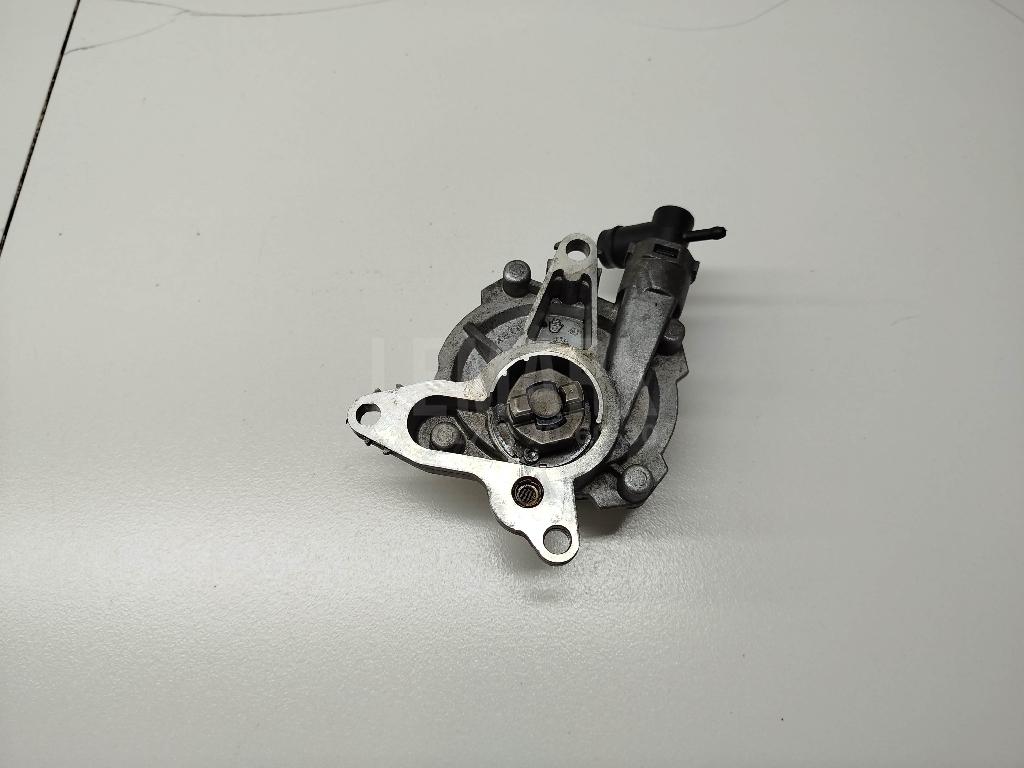 Насос вакуумный 1465000Q1N Nissan