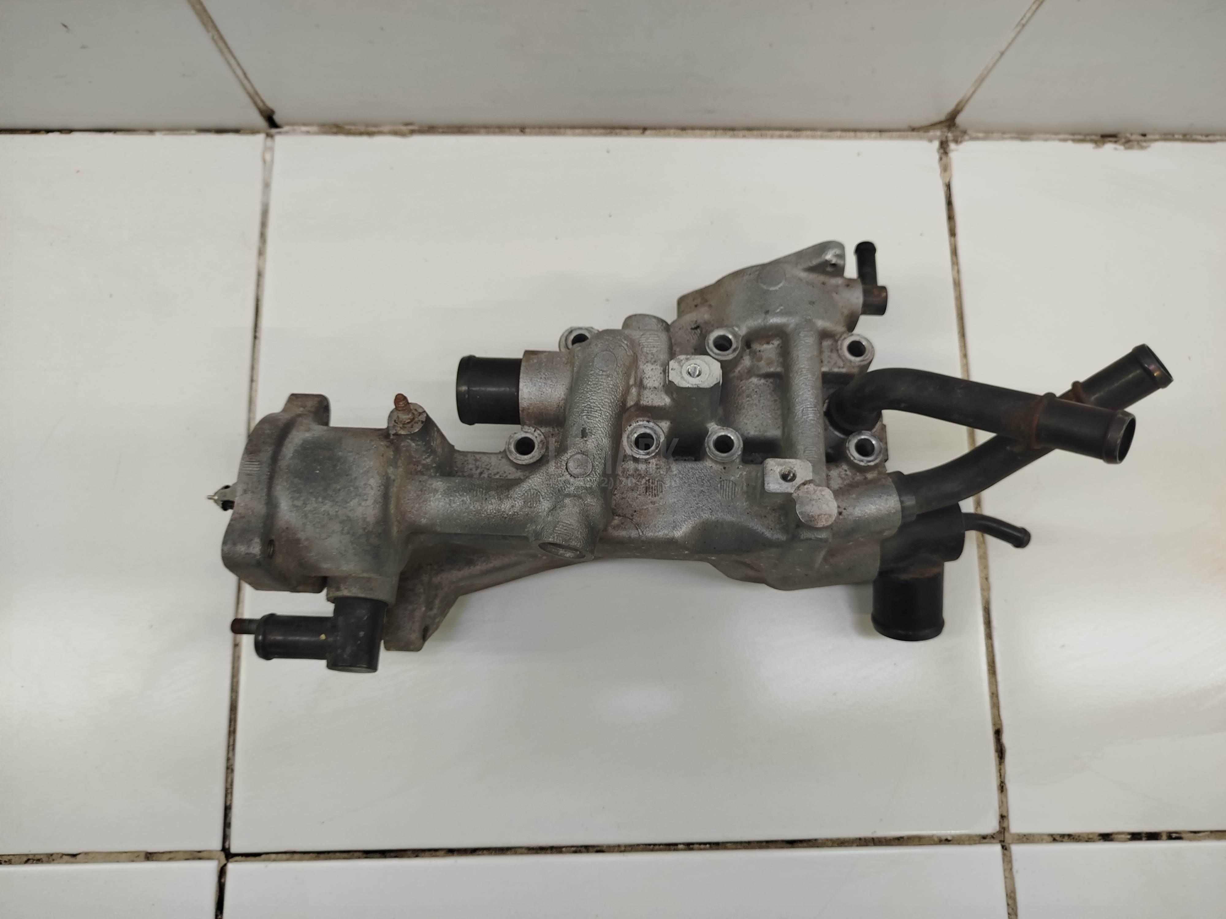 Корпус термостата 256102F700 Hyundai-Kia