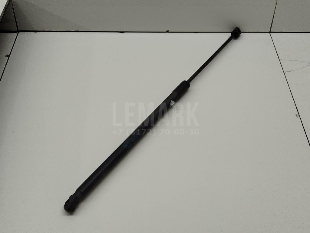 Амортизатор двери багажника 13258179 GM