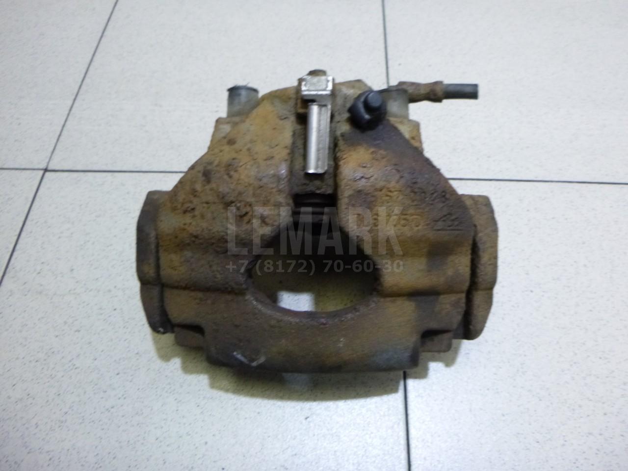 Суппорт тормозной передний левый 7L6615123F VAG