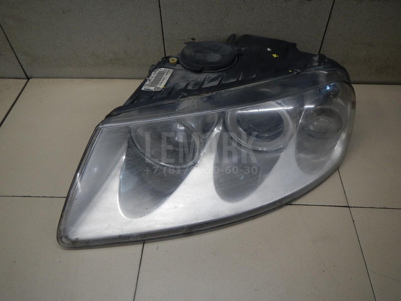 Фара левая 7L6941017BH VAG