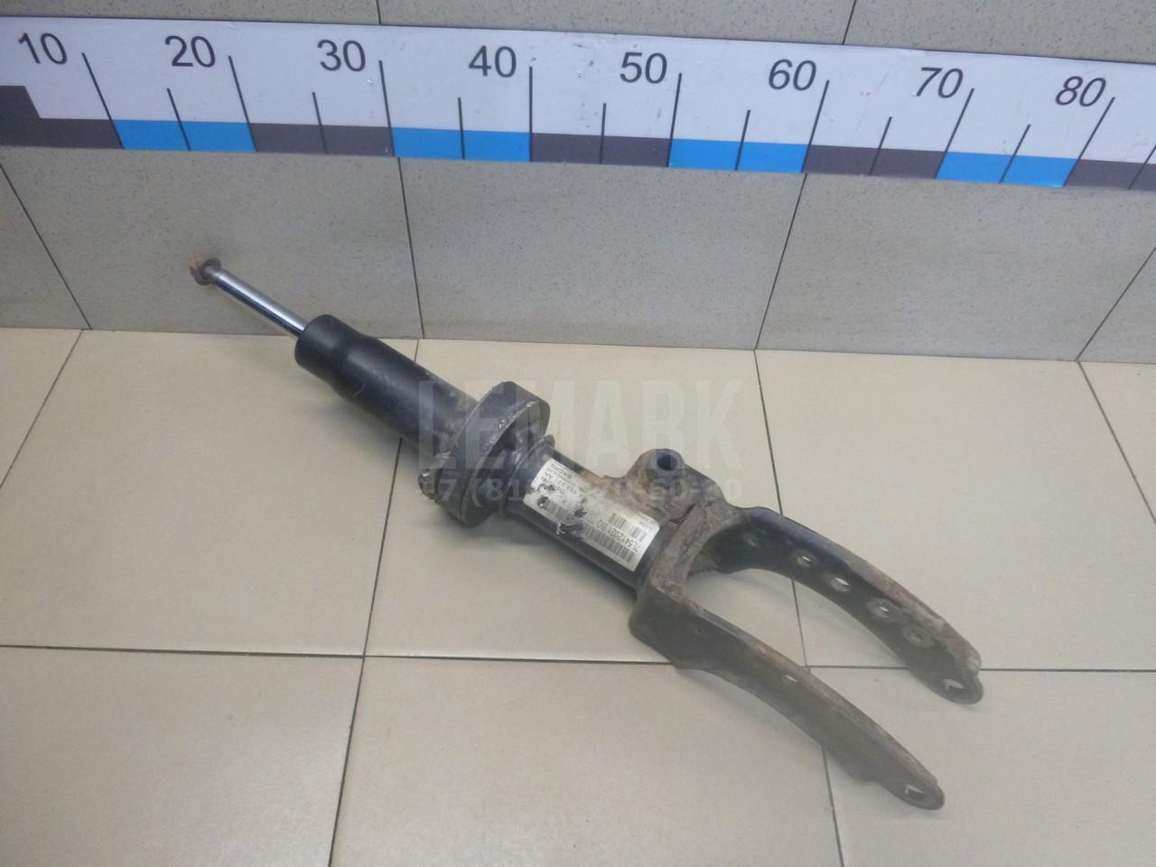 Амортизатор передний левый 95534304311 VAG