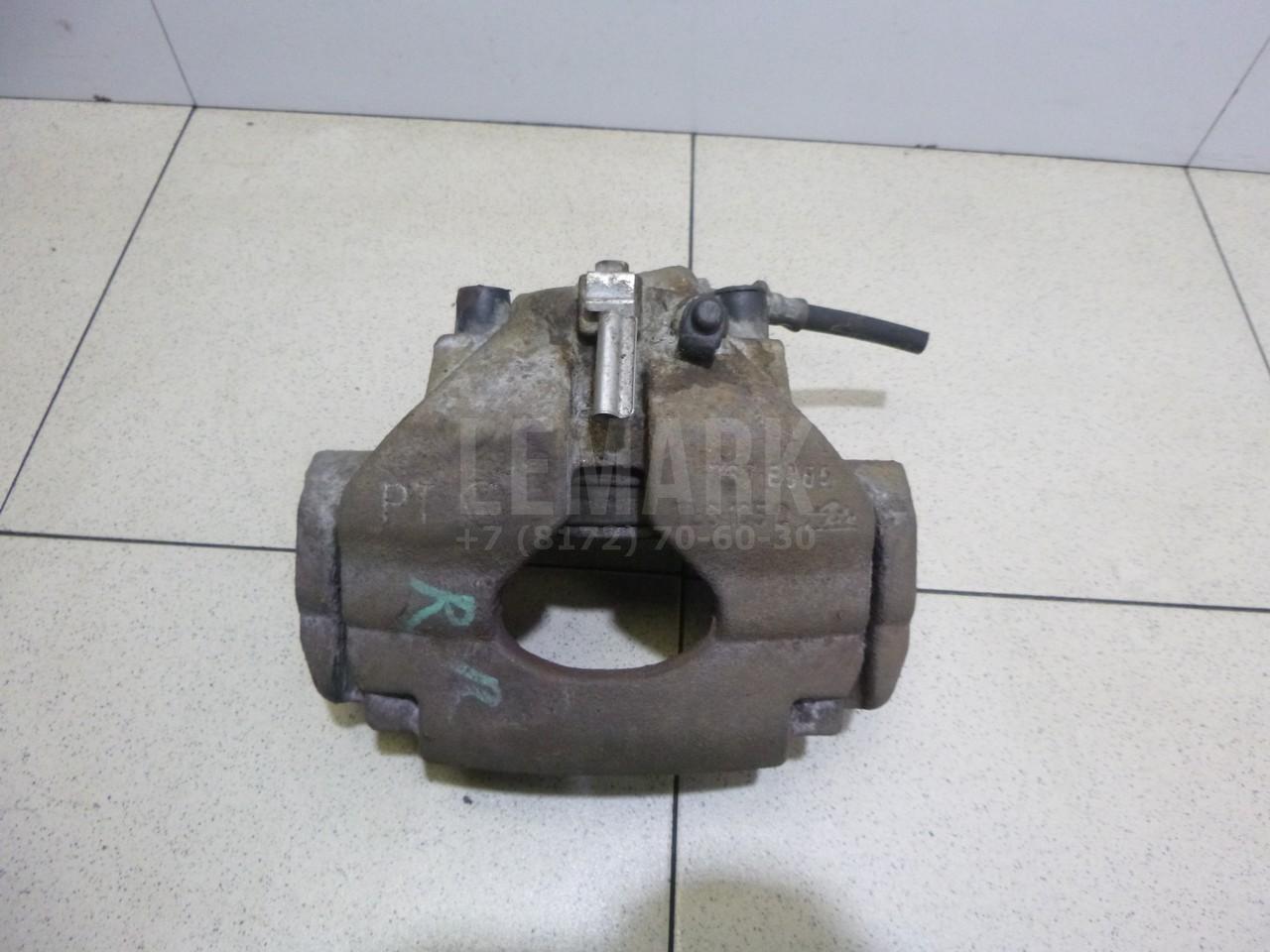 Суппорт тормозной передний левый 7L6615123F VAG