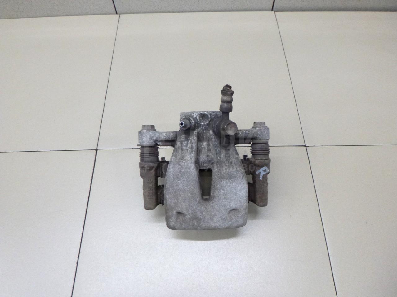 Суппорт тормозной задний правый 4773005071 Toyota