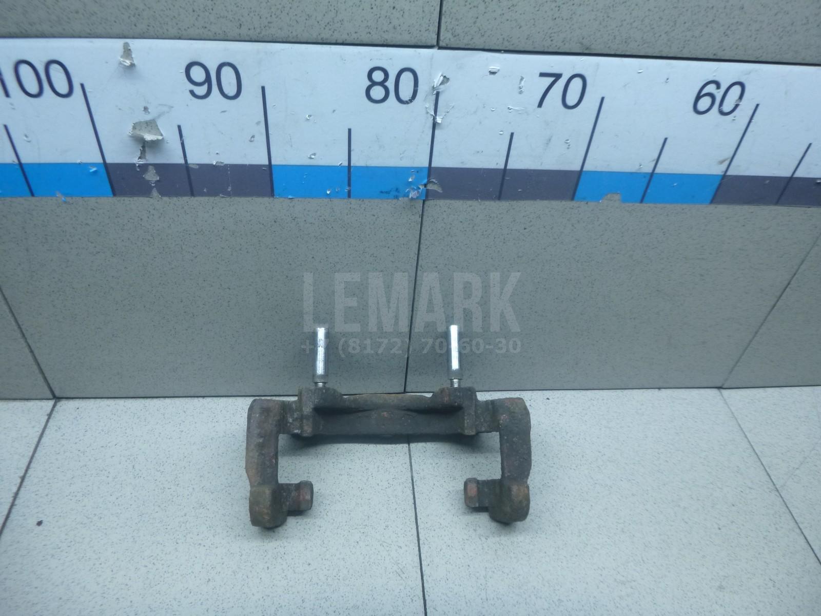 Скоба суппорта переднего LR000567 Land Rover