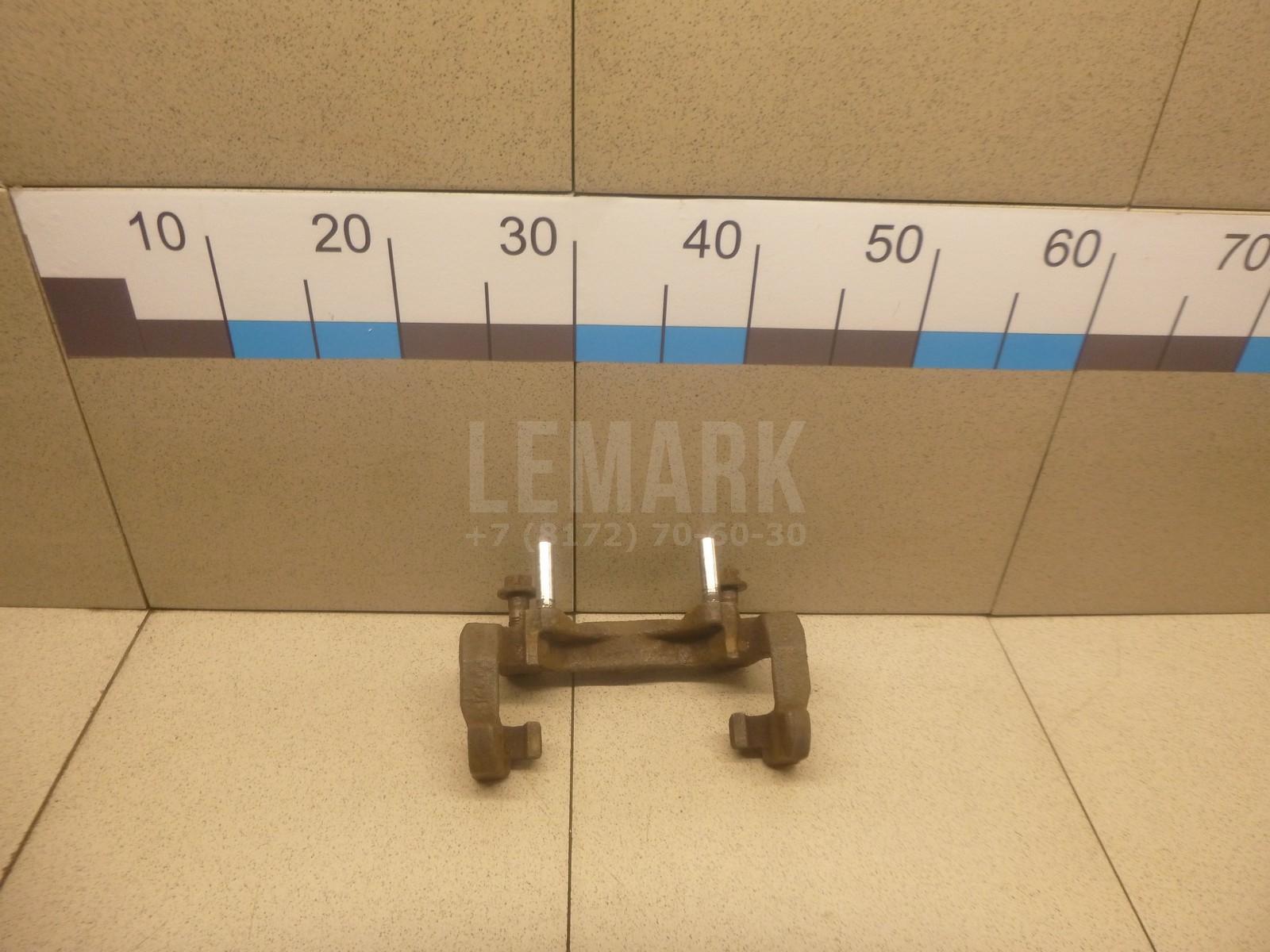 Скоба суппорта переднего LR000567 Land Rover