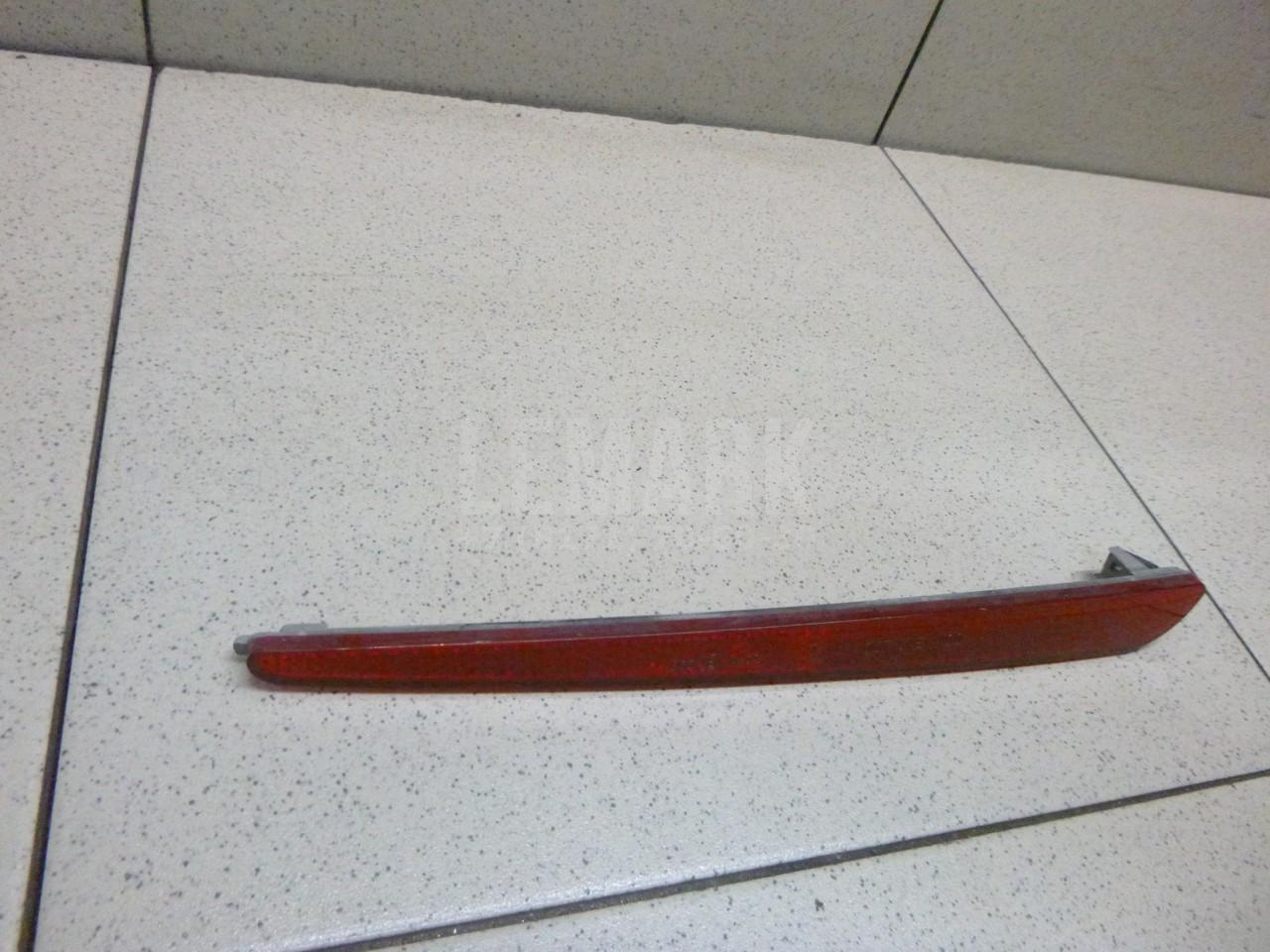 Отражатель задний для  Cadillac CTS 2002-2008