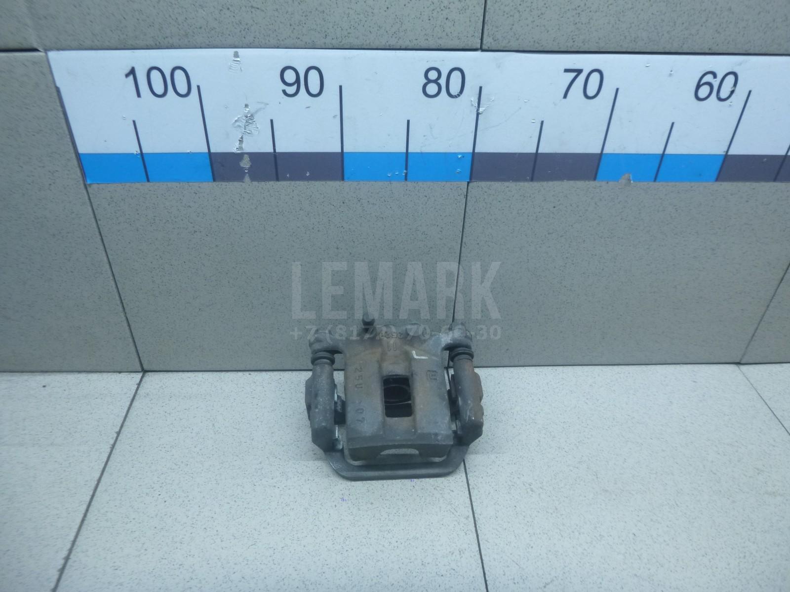 Суппорт тормозной задний левый 44011JG00A Nissan