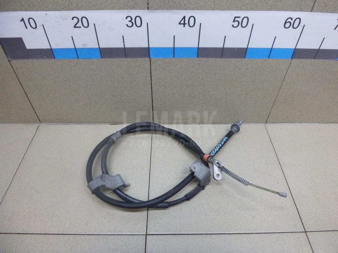 Трос стояночного тормоза левый 36531JD00A Nissan