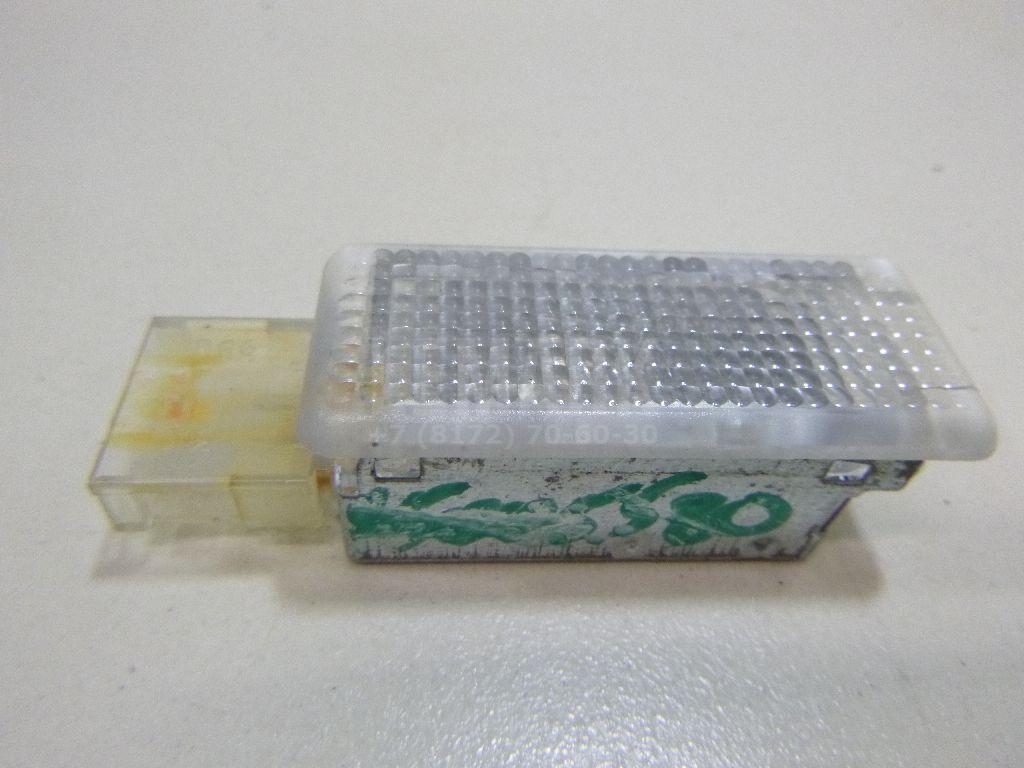 Фонарь подсветки двери 6L0947565 VAG