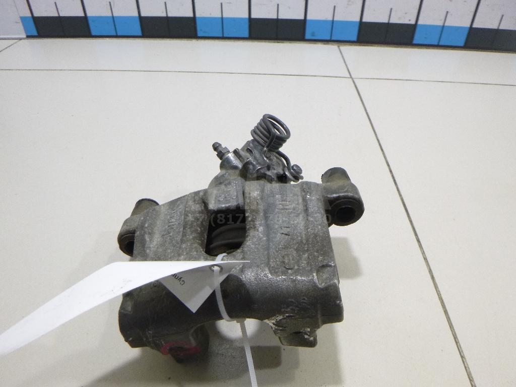 Суппорт тормозной задний правый 1761755 Ford