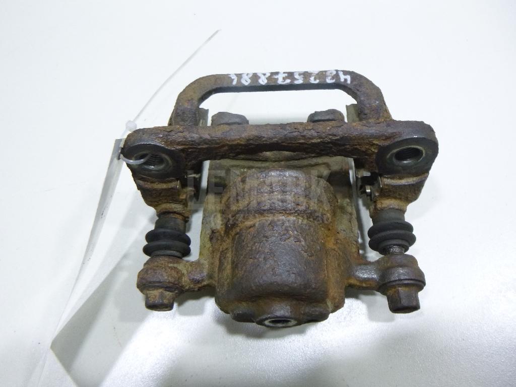 Суппорт тормозной задний левый 440111KD0A Nissan