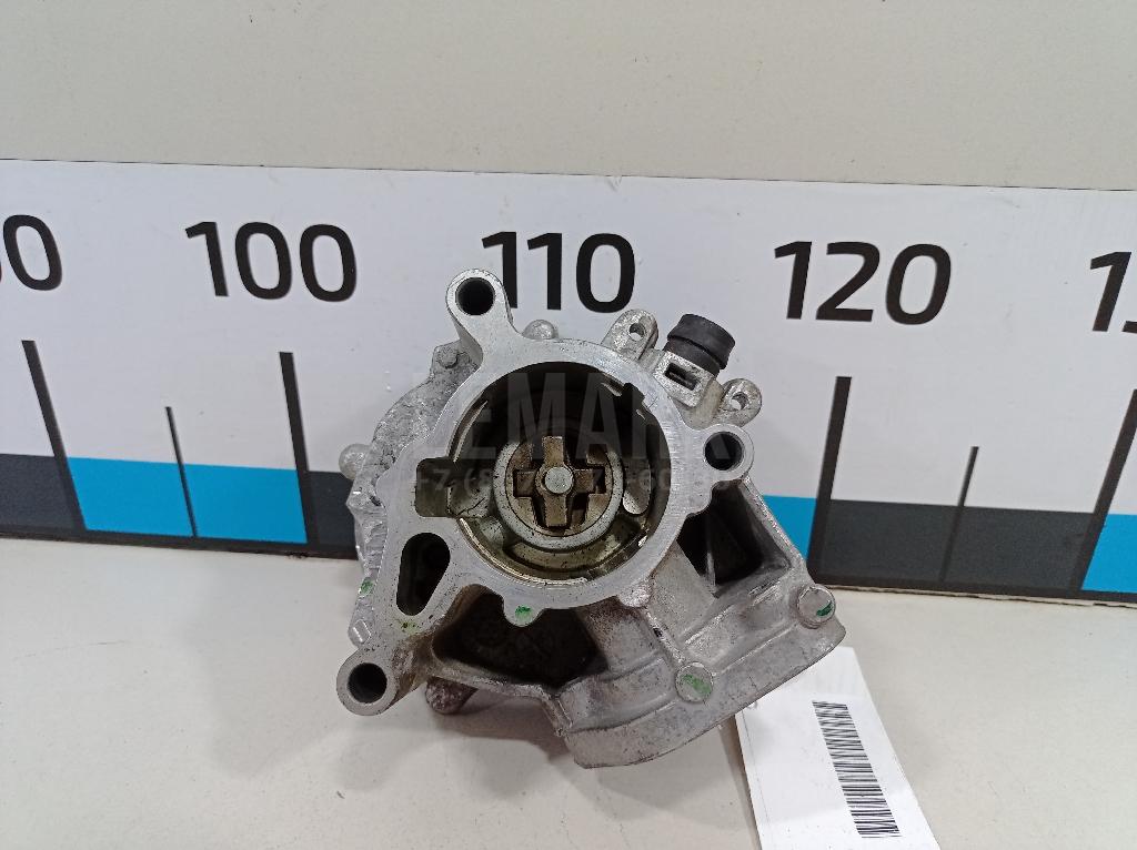 Насос вакуумный 06K145100BB VAG