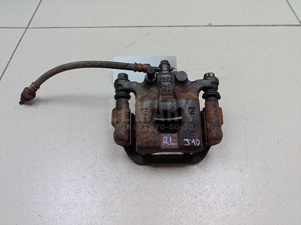 Суппорт тормозной задний левый 440111KD0A Nissan