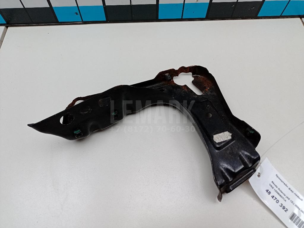 Кронштейн фар левый 1Z0805071A VAG