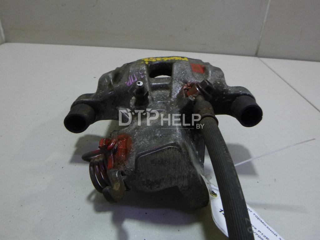 Фото Суппорт тормозной задний правый для Nissan Primera P12E  2003