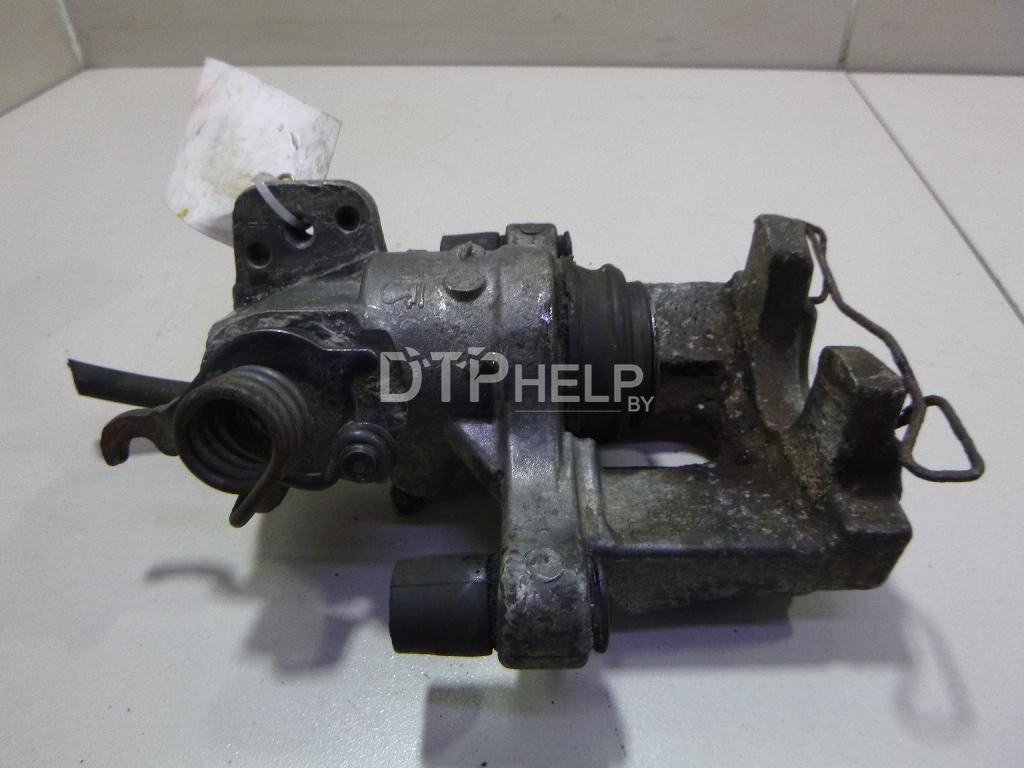 Фото Суппорт тормозной задний правый для Nissan Primera P12E  2003