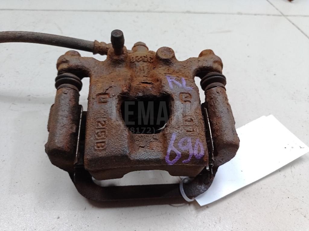 Суппорт тормозной задний левый 440111KD0A Nissan
